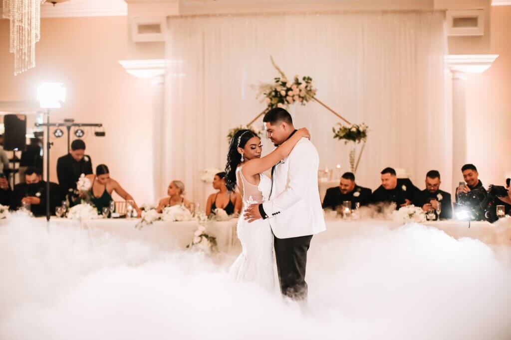 Dancing on the clouds for their First dance as husband and wife in Bakersfield at a beautiful European style wedding venue.