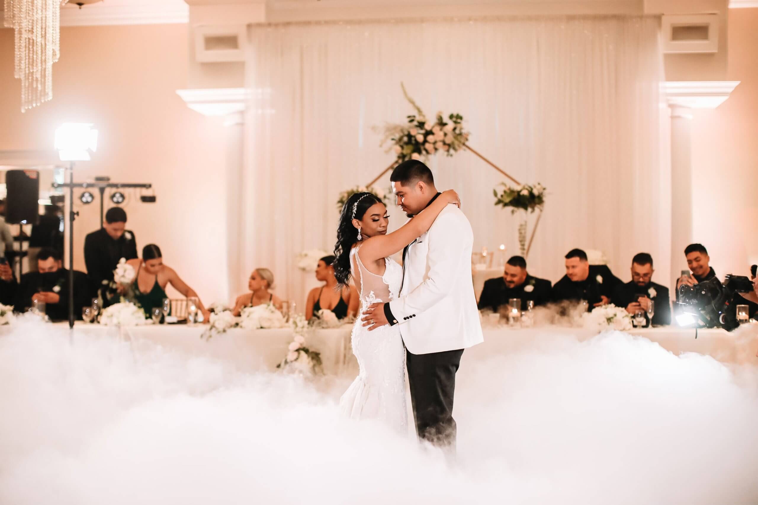 Dancing on the clouds for their First dance as husband and wife in Bakersfield at a beautiful European style wedding venue.