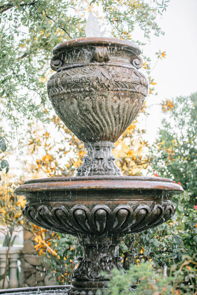 A European tuscan style water fountain is one of the main features at this elegant wedding venue in Bakersfield.